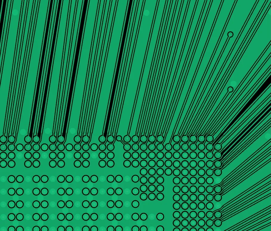 A corner of a BGA from a compile: signals escape between the bumps, and each trace widens automatically to meet its target impedance